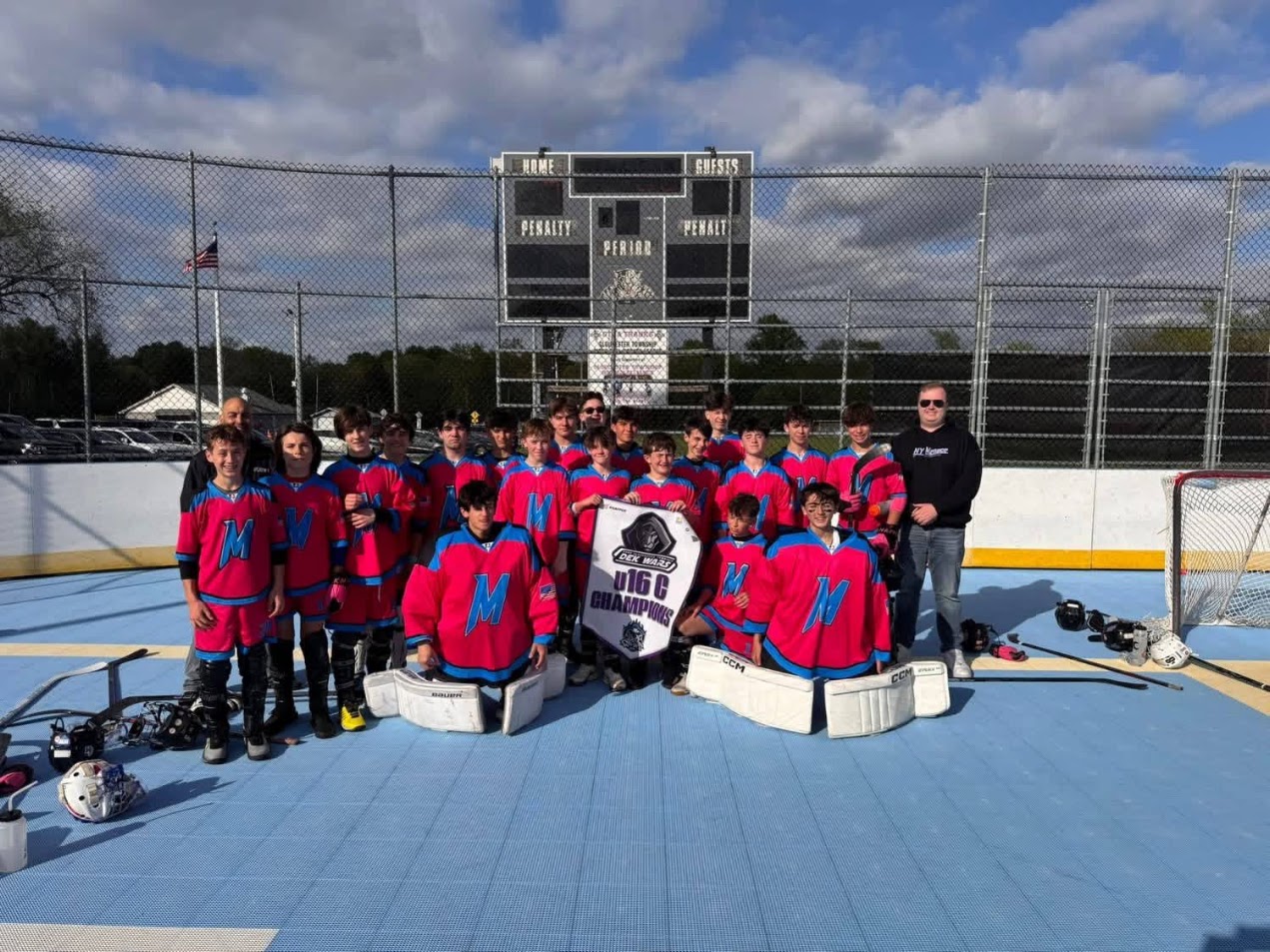 NY Menace Cadet C youth DEK hockey team celebrating its Dek Wars championship